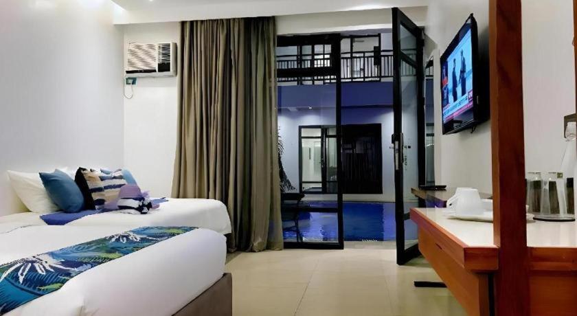White Breeze Palawan Boutique Hotel Puerto Princesa Exterior foto